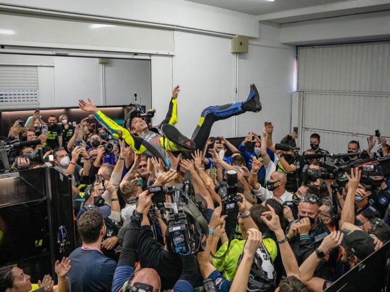 Rossi’s friends and crew cheer him on after his last MotoGP race.