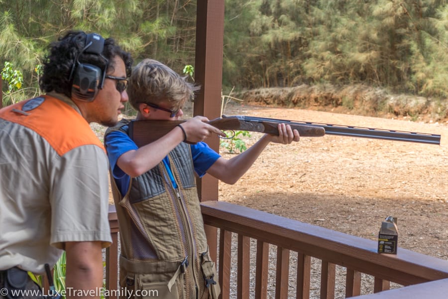 Boy learning to shoot sporting clays on Lanai Hawaii