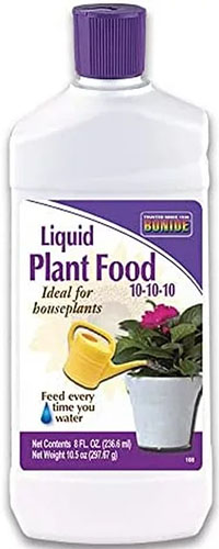 A vertical image of a white and purple bottle of Bonide\'s 10-10-10 liquid plant food in front of a white background.