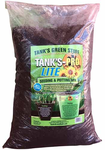 A vertical product photo of a bag of Tank\'s Green Stuff Potting mix.